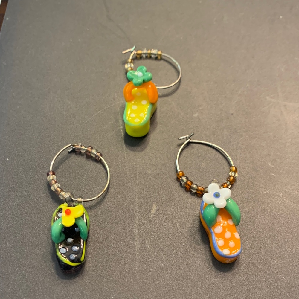 Pier 1 drink charms in the shape of flip flops. Only 3 charms available.